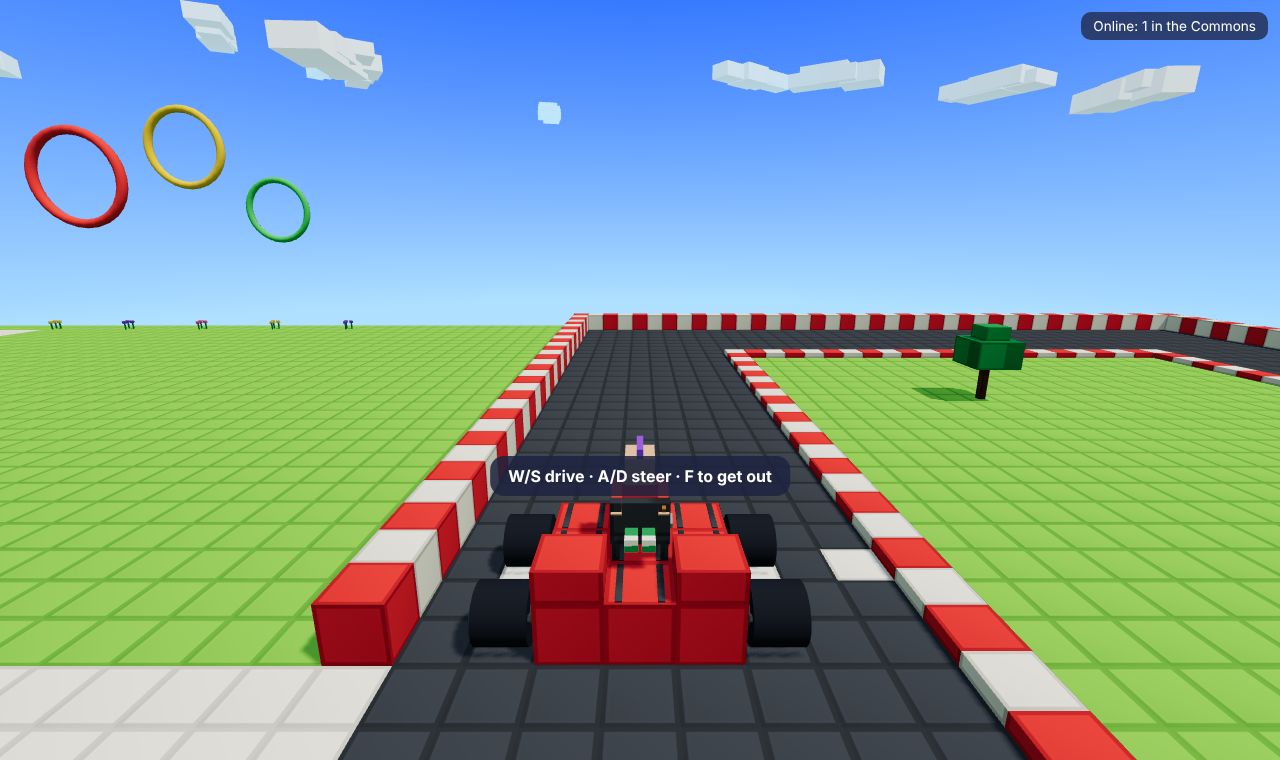 A red go-kart on a racetrack with red and white kerbs in the Commons, with giant hoops in the sky