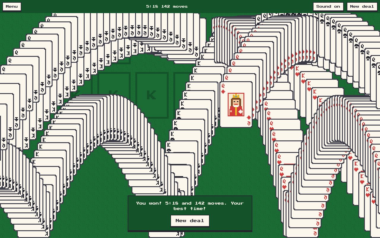 A won game: cards bouncing across the table in long trails, and a message with the time and the number of moves